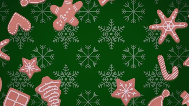 Animation of christmas gingerbread cookies over snowflakes pattern on green background
