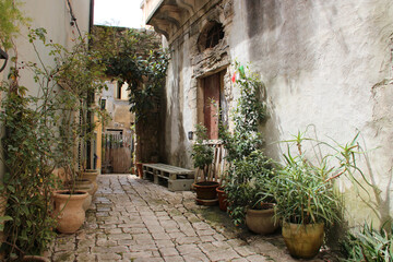 alley and houses in ragusa in sicily in italy  - obrazy, fototapety, plakaty