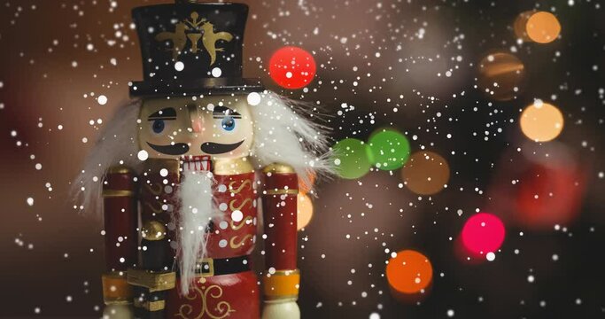 Animation of snow and lights over nutcracker