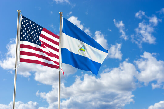 United States of America and Nicaragua flags over blue sky background. 3D illustration
