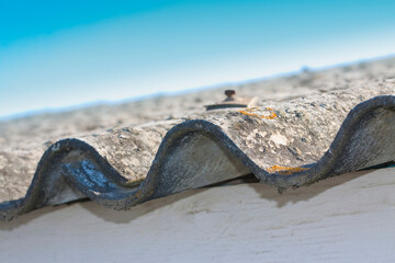 Old aged dangerous asbestos roof - one of the most dangerous materials in buildings so-called...