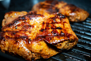 Seasoned sirloin steak on a grill pan. steak large. Selective focus