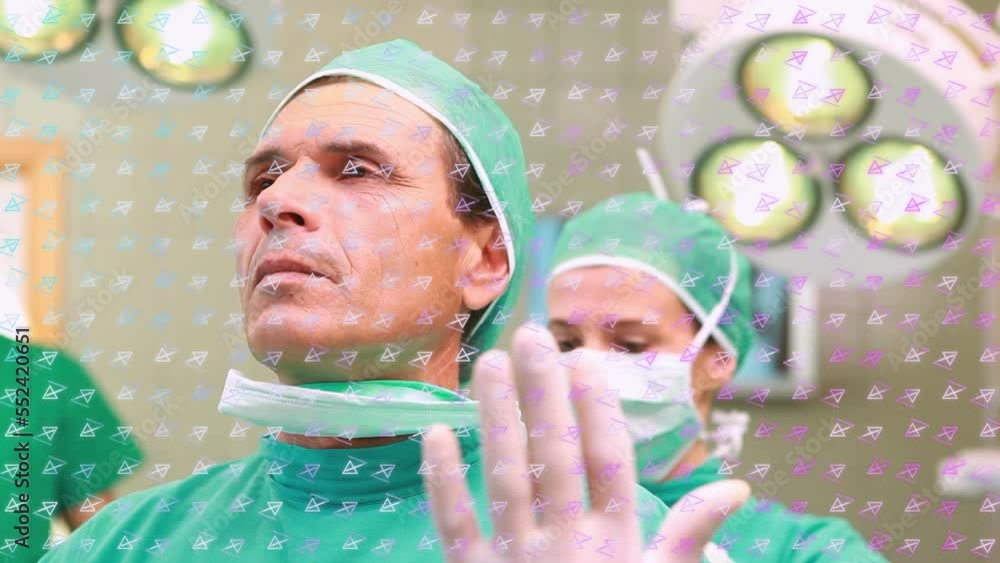 Poster animation of rows of pattern over diverse surgeons in operating theatre