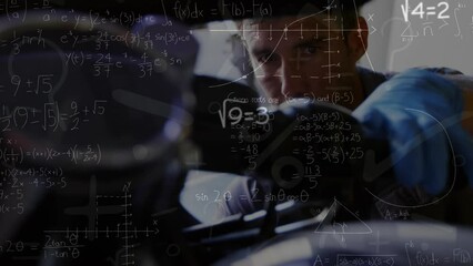 Animation of mathematical equations over caucasian male mechanic in workshop - Powered by Adobe