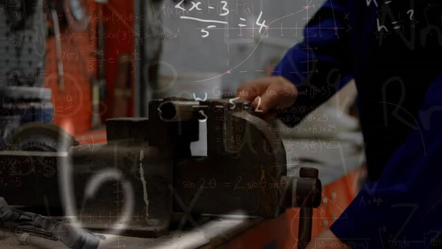 Animation of mathematical equations over caucasian male mechanic in workshop