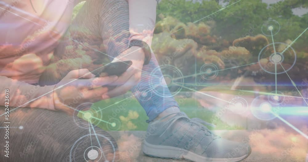 Poster animation of dots connected with lines and clouds over caucasian woman using smartphone at park
