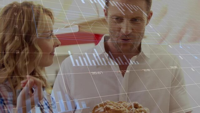 Animation of infographic interface over caucasian happy couple smelling bread in store