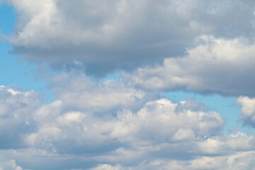 White clouds in the blue sky. Picture background website or art work design.