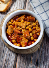 Top view of tripe casserole with chickpeas. Winter comfort food. (Callos a la madrileña)