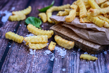  Home made   organic   Fresh fried French fries with ketchup saue  on wooden background