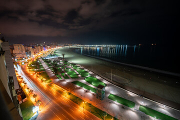 Fototapeta na wymiar Panoramic view over the buildings downtown Tanger at night in Morocco