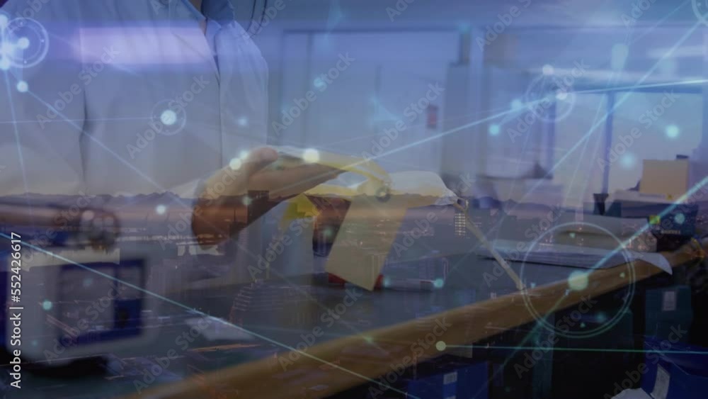 Aufkleber animation of dots connected with lines over caucasian female scientist working in laboratory