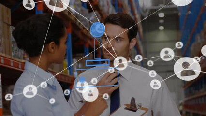 Animation of abstract pattern, icons connected over multiracial coworkers discussing in warehouse - Powered by Adobe