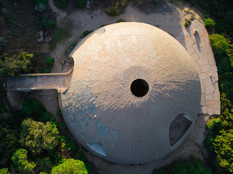 Aerial View of abandoned futuristic house  belonged to the former Oscar winner Michelangelo Antonioni,  The "Dome Cupole" named for its shape  built in 1970 by Dante Bini in Costa Paradiso Sardinia