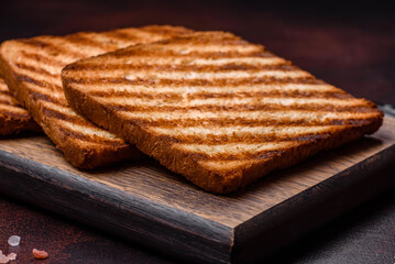 Tasty fresh crispy bread slices in the form of grilled toast