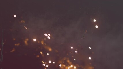 Animation of fire sparks and smoke over mathematical equations and diagrams against black background - Powered by Adobe