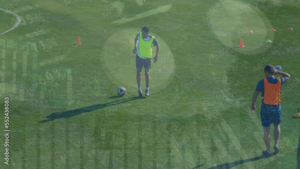 Aufkleber animation of statistical data processing over male soccer player practicing soccer on sports field