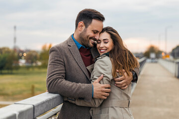 Autumn portrait of attractive happy couple