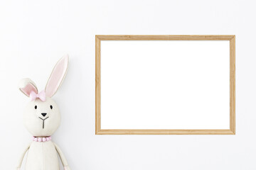 Fototapeta premium Wood frame mockup and toy