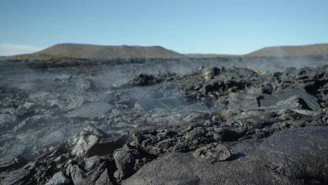 close up view of lava with smoke at Fagradalsfjall volcano
