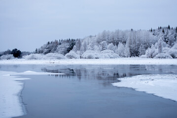 Frosty cold winter day in a river landscape. Farnebofjarden national park in north of Sweden.