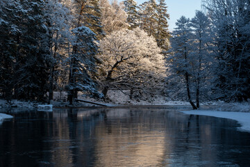 Frosty cold winter day in a river landscape. Farnebofjarden national park in north of Sweden.
