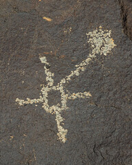 Petroglyph stick figure at Boca Negra Canyon at Petroglyph National Monument in Albuquerque, New Mexico