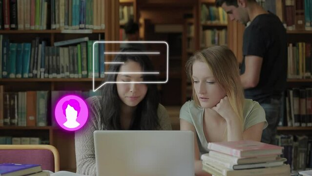 Animation of profile and message icon over two diverse girls using laptop and studying at college
