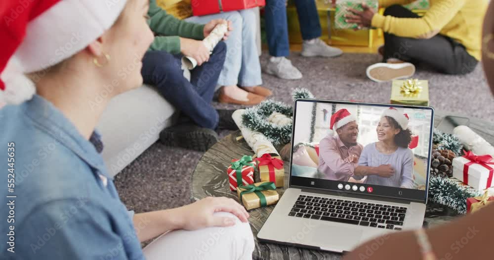 Canvas Prints Diverse group of friends having christmas video call with african american couple