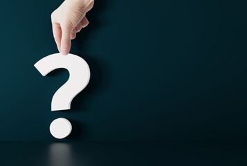 The hand is holding a question mark. Business concept, thinking, caution on business. Question mark...