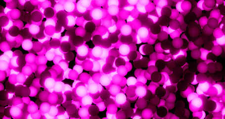 Purple beautiful bright luminous shiny iridescent balls circles of festive New Year's Christmas garlands or toys. Abstract background
