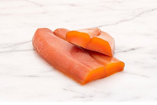 Close-up of a cut bottarga, dried mullet fish roe
