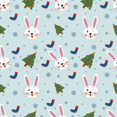 Seamless new year pattern with rabbit, snowflakes, christmas tree and christmas socks on blue background. seamless pattern Merry christmas and happy new year. vector illustration