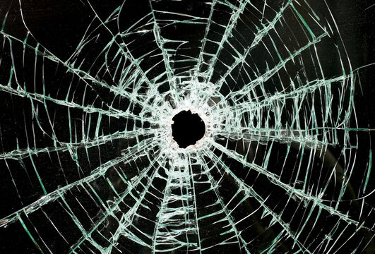 Glass shattered by a bullet example