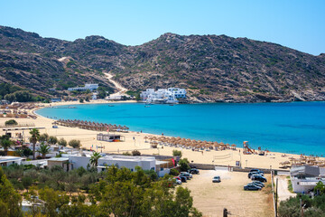 Naklejka na ściany i meble Breathtaking panoramic view of the famous Mylopotas beach in Ios Greece