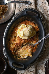 Sweet crunchy and crispy apple crumble served with ice-cream