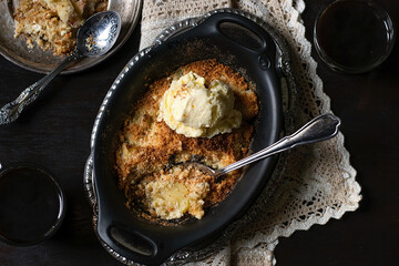 Sweet crunchy and crispy apple crumble served with ice-cream
