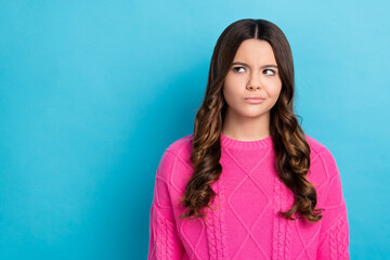 Fototapeta premium Photo of minded lady look empty space suspicious offer hmm hard decision isolated on blue color background