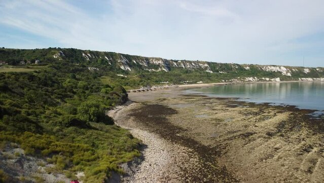 Folkestone drone flight over the Warren with view to the beach and cliffs 