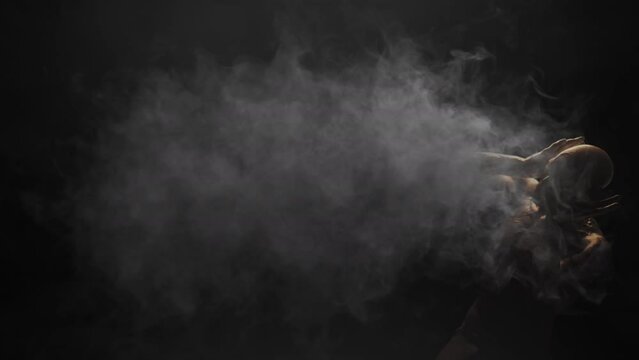 Animation of zombie with smoke on black background