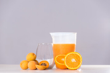 orange juice in a glass, and apricot, fresh and nutritious, diet