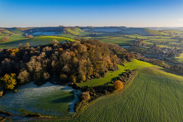 Aerial view of the Cadbury Hillfort and surrounding countryside in winter, Somerset, UK