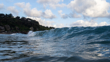 Wall of wave breaking on the coast.