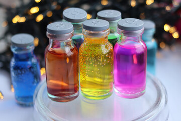 Solutions of organic indicator dyes: methyl orange in acidic and neutral environments and phenolphthalein in alkaline environment.