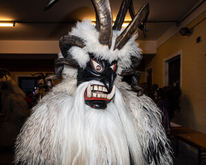 Costume of Krampus, a Christmas devil, at a traditional Christmas festive procession, Austria, Salzburg