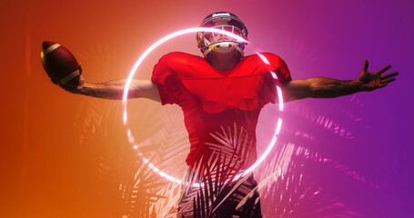 Composite of american football player with arms outstretched by illuminated circle and plants