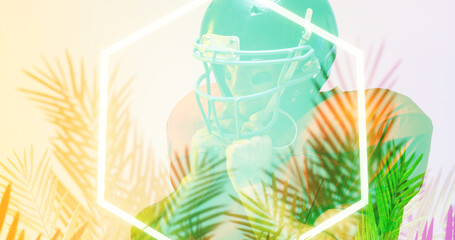 Close-up of american football player wearing helmet by glowing hexagon and plants, copy space
