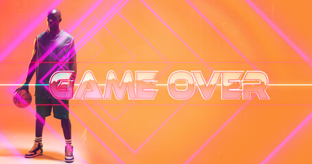 Naklejka premium Composite of game over text with pink lines and bald african american basketball player with ball
