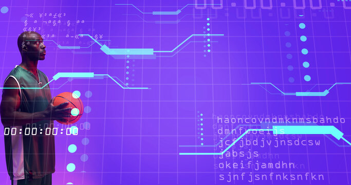 African american bald player holding basketball standing over grid pattern with computer language