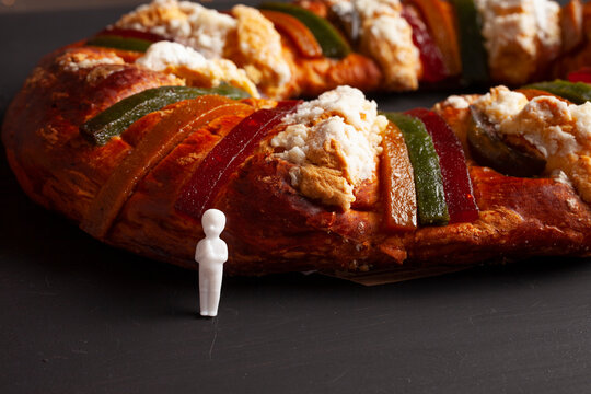 Traditional rosca de reyes on black background